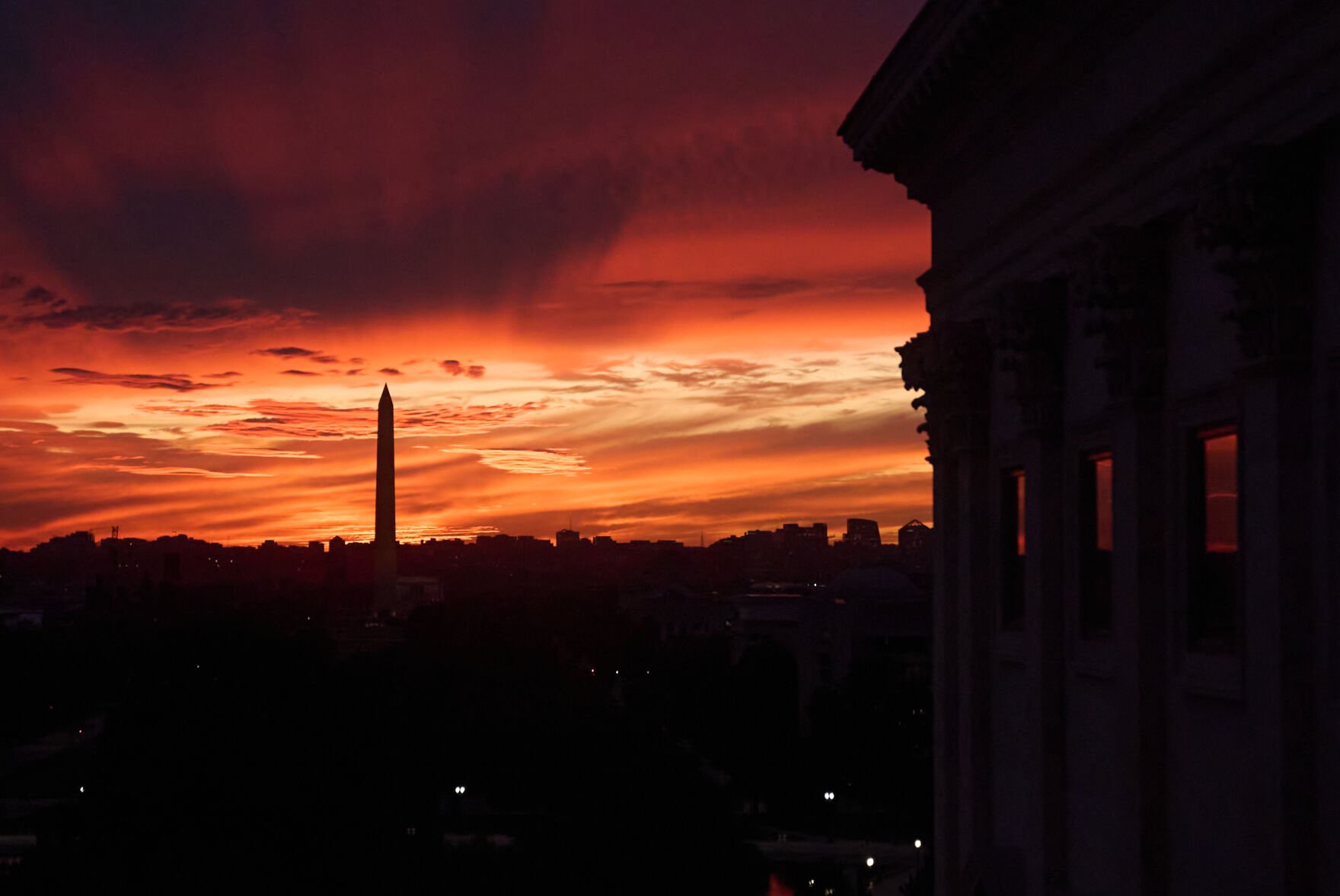 <p>The sunset is seen from the Capitol before Republican and Democratic news conferences about the government shutdown Tuesday on Capitol Hill in Washington.</p>