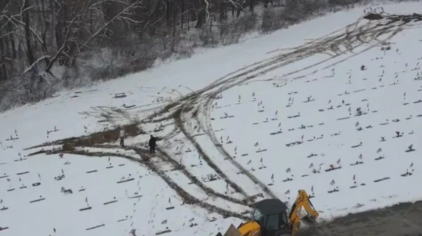 People Upset After Crews Drove Heavy Machinery Over Headstones And Graves At Cemetery