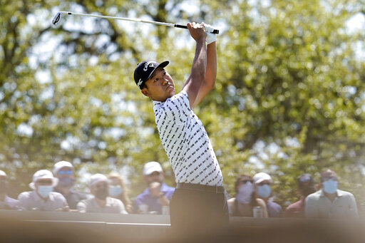 The Latest: Kevin Na Sends Johnson To Another Early Exit