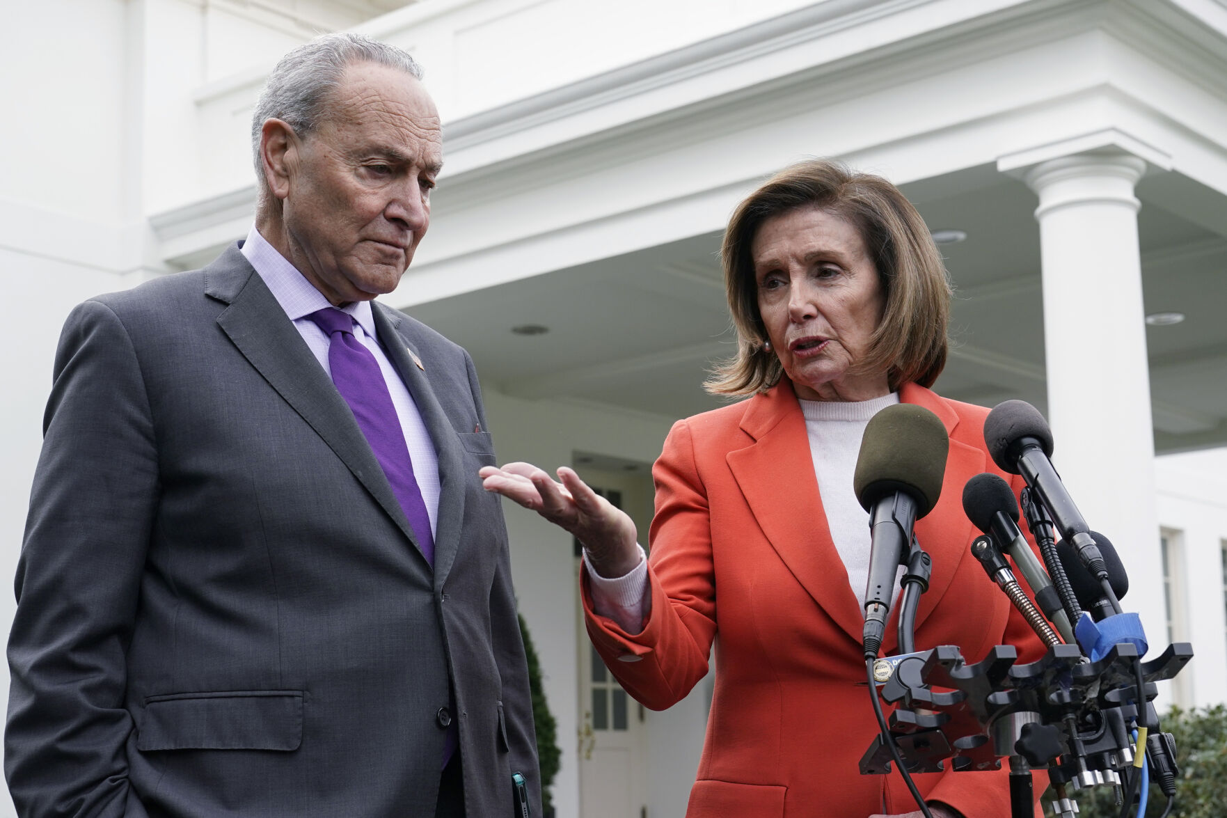 <p>FILE - Senate Majority Leader Chuck Schumer of N.Y., right, listens as House Speaker Nancy Pelosi of Calif., left, speaks to reporters at the White House in Washington, Nov. 29, 2022, about their meeting with President Joe Biden. Congress is moving swiftly to prevent a looming U.S. rail workers strike. Lawmakers are reluctantly intervening in a labor dispute to stop what would surely be a devastating blow to the nation’s economy if the transportation of fuel, food and other critical goods was disrupted (AP Photo/Susan Walsh)</p>