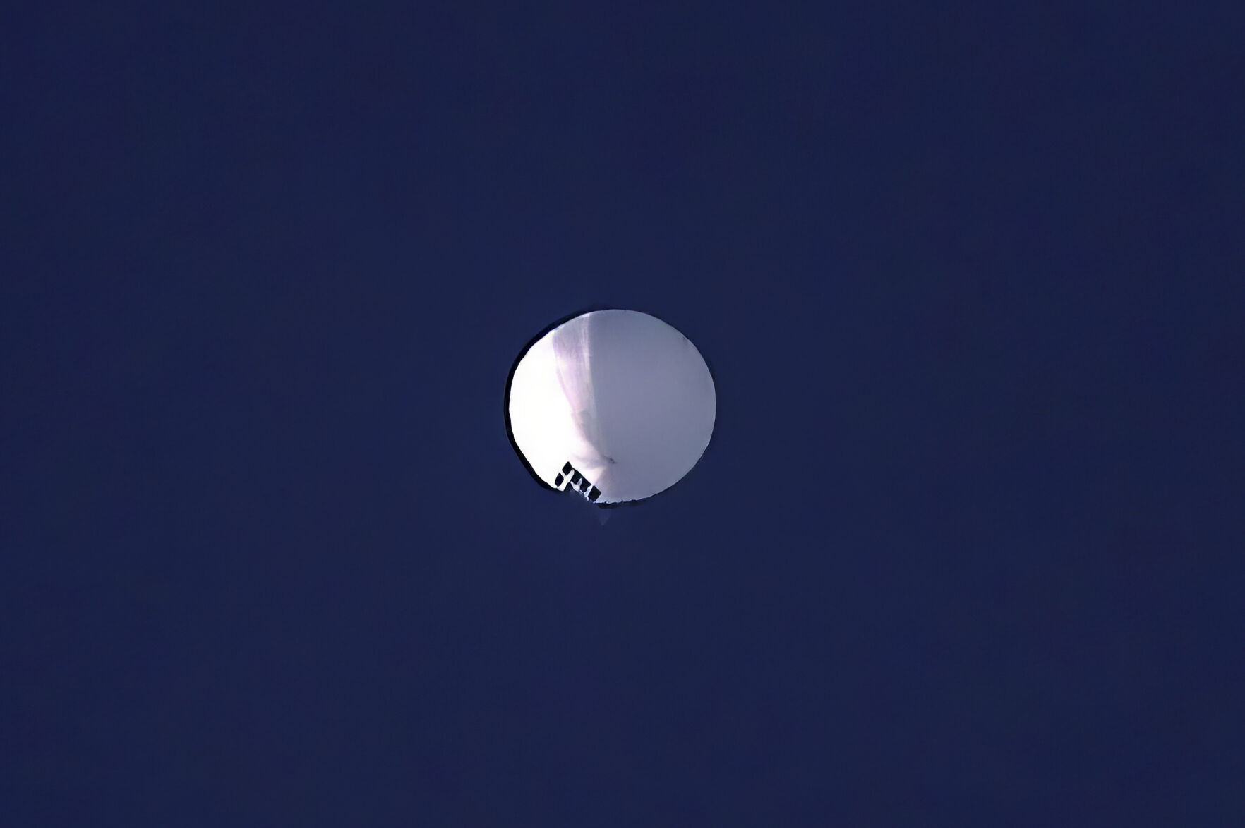 <p>A high altitude balloon floats over Billings, Mont., on Wednesday, Feb. 1, 2023. The U.S. is tracking a suspected Chinese surveillance balloon that has been spotted over U.S. airspace for a couple days, but the Pentagon decided not to shoot it down due to risks of harm for people on the ground, officials said Thursday, Feb. 2, 2023.</p>