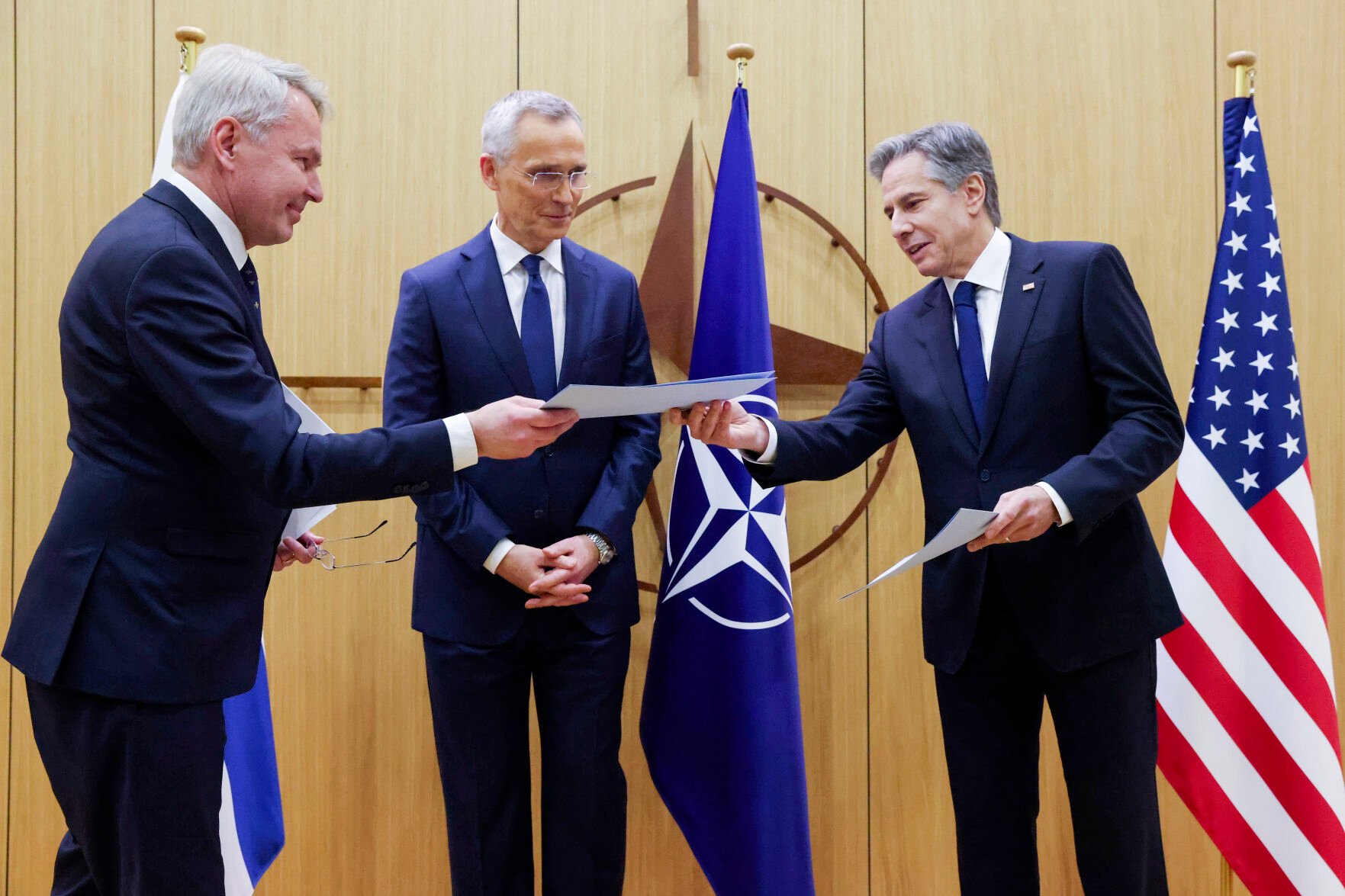 <p>Finnish Foreign Minister Pekka Haavisto, left, hands over his nation's accession document to United States Secretary of State Antony Blinken, right, during a meeting of NATO foreign ministers at NATO headquarters in Brussels, Tuesday, April 4, 2023. </p>