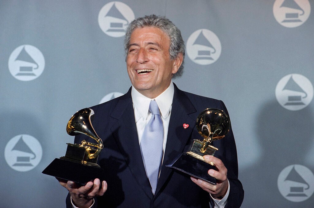 <p>FILE - Veteran singer Tony Bennett displays his two Grammy's backstage at the Shrine Auditorium in Los Angeles Wednesday, March 1, 1995.</p>