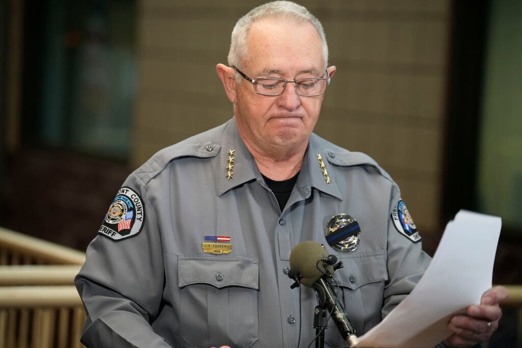 <p>Fremont County, Colo., Sheriff Allen Cooper reacts to a question during a news conference, Friday, Oct. 6, 2023, in Canon City, Colo. </p>