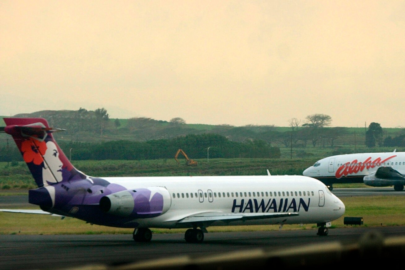 <p>An Hawaiian Airlines plane taxis for position March 24, 2005, at Kahalui, Hawaii, on the island of Maui.</p>