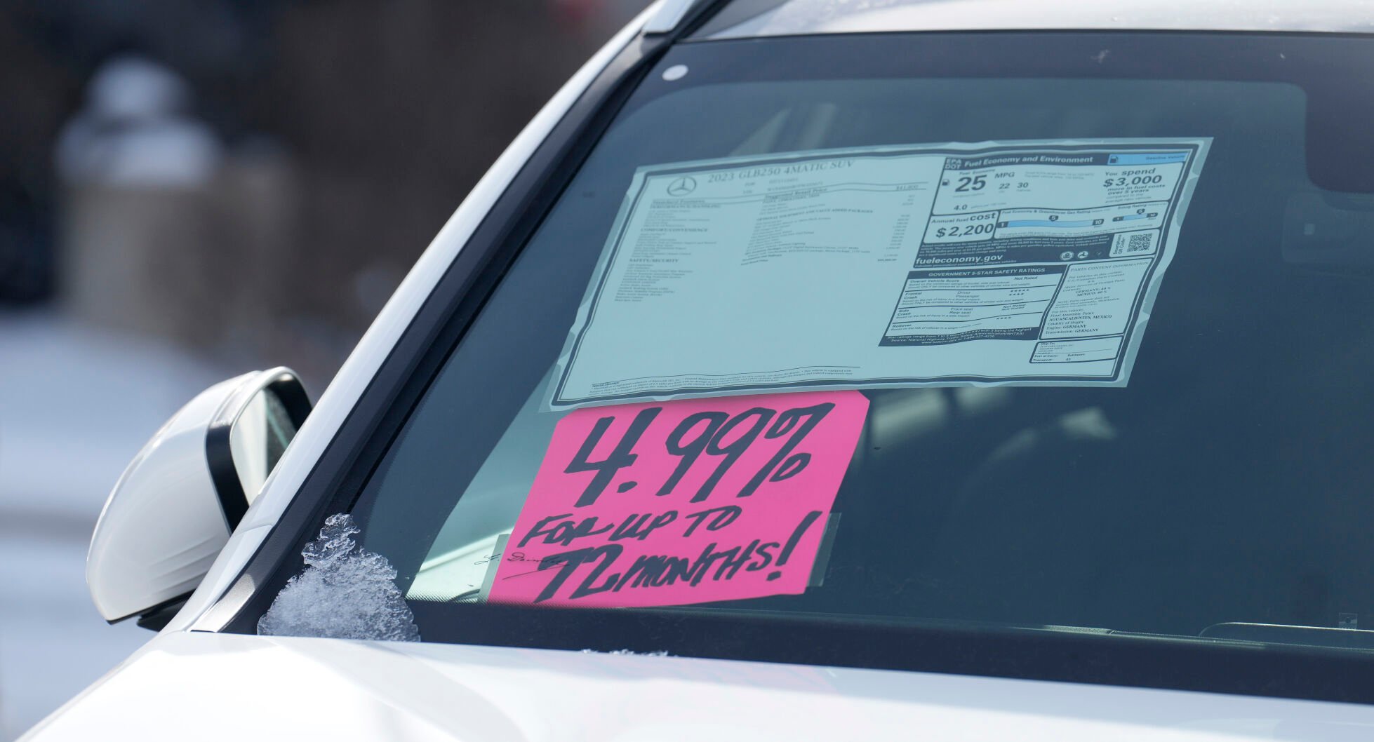 <p>A sign highlighting the financing interest rate is displayed near the price sticker on an unsold 2023 vehicle at a Mercedes-Benz dealer on Thursday, Nov. 30, 2023, in Loveland, Colo. On Tuesday, the Labor Department issues its report on inflation at the consumer level in November. (AP Photo/David Zalubowski)</p>