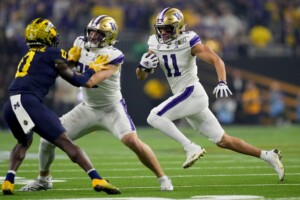 Michigan Completes Undefeated Season With 34 13 College Football Playoff Championship Game Victory Over Washington