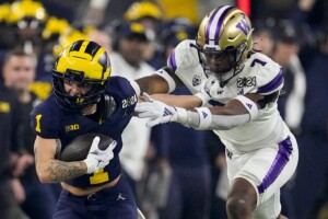 Michigan Completes Undefeated Season With 34 13 College Football Playoff Championship Game Victory Over Washington