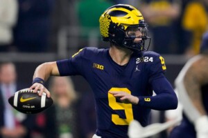 Michigan Completes Undefeated Season With 34 13 College Football Playoff Championship Game Victory Over Washington