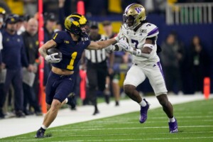 Michigan Completes Undefeated Season With 34 13 College Football Playoff Championship Game Victory Over Washington