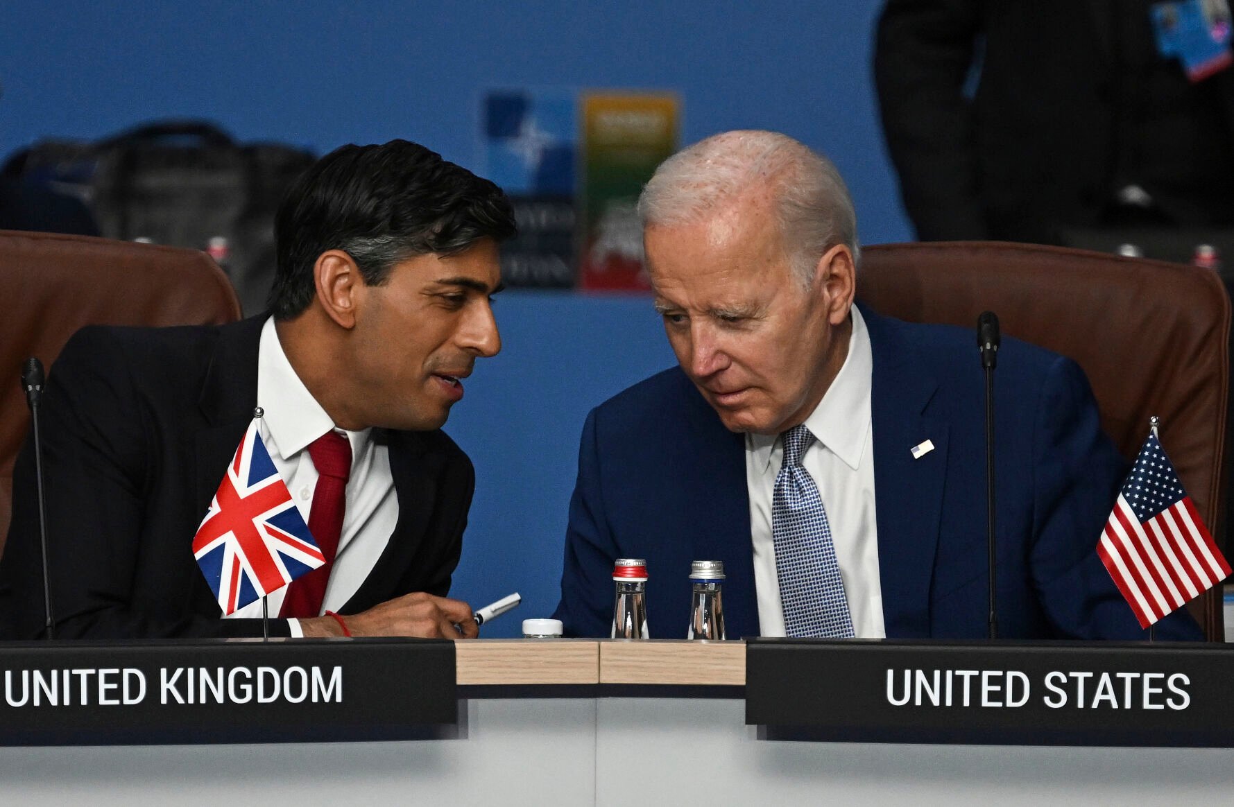 <p>Britain's Prime Minister Rishi Sunak, left, and U.S. President Joe Biden speak July 11 at the start of the meeting of the North Atlantic Council (NAC) during the NATO Summit in Vilnius, Lithuania. U.S. and British militaries are bombing more than a dozen sites used by the Iranian-backed Houthis in Yemen, in a massive retaliatory strike using warship-launched Tomahawk missiles.  </p>