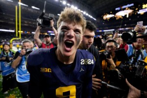 Michigan Completes Undefeated Season With 34 13 College Football Playoff Championship Game Victory Over Washington