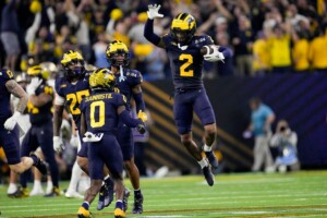 Michigan Completes Undefeated Season With 34 13 College Football Playoff Championship Game Victory Over Washington