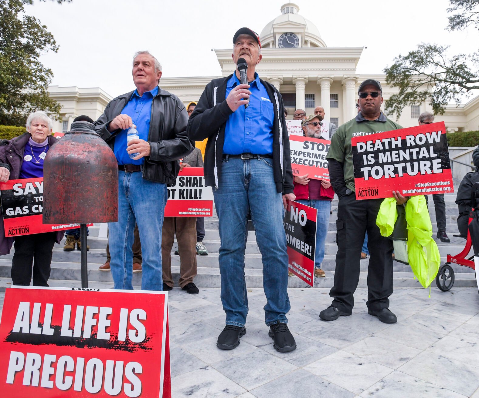 <p>Former death row inmates who were exonerated, from left, Randall Padgent, Gary Drinkard and Ron Wright, were among the nearly one hundred protestors gathered at the state capitol building in Montgomery, Ala., on Tuesday Jan. 23, 2024, to ask Governor Kay Ivey to stop the planned execution of Kenneth Eugene Smith.  </p>