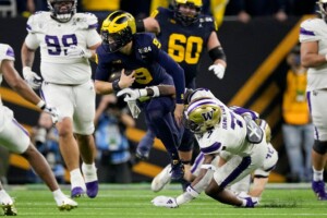 Michigan Completes Undefeated Season With 34 13 College Football Playoff Championship Game Victory Over Washington