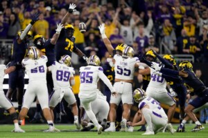 Michigan Completes Undefeated Season With 34 13 College Football Playoff Championship Game Victory Over Washington