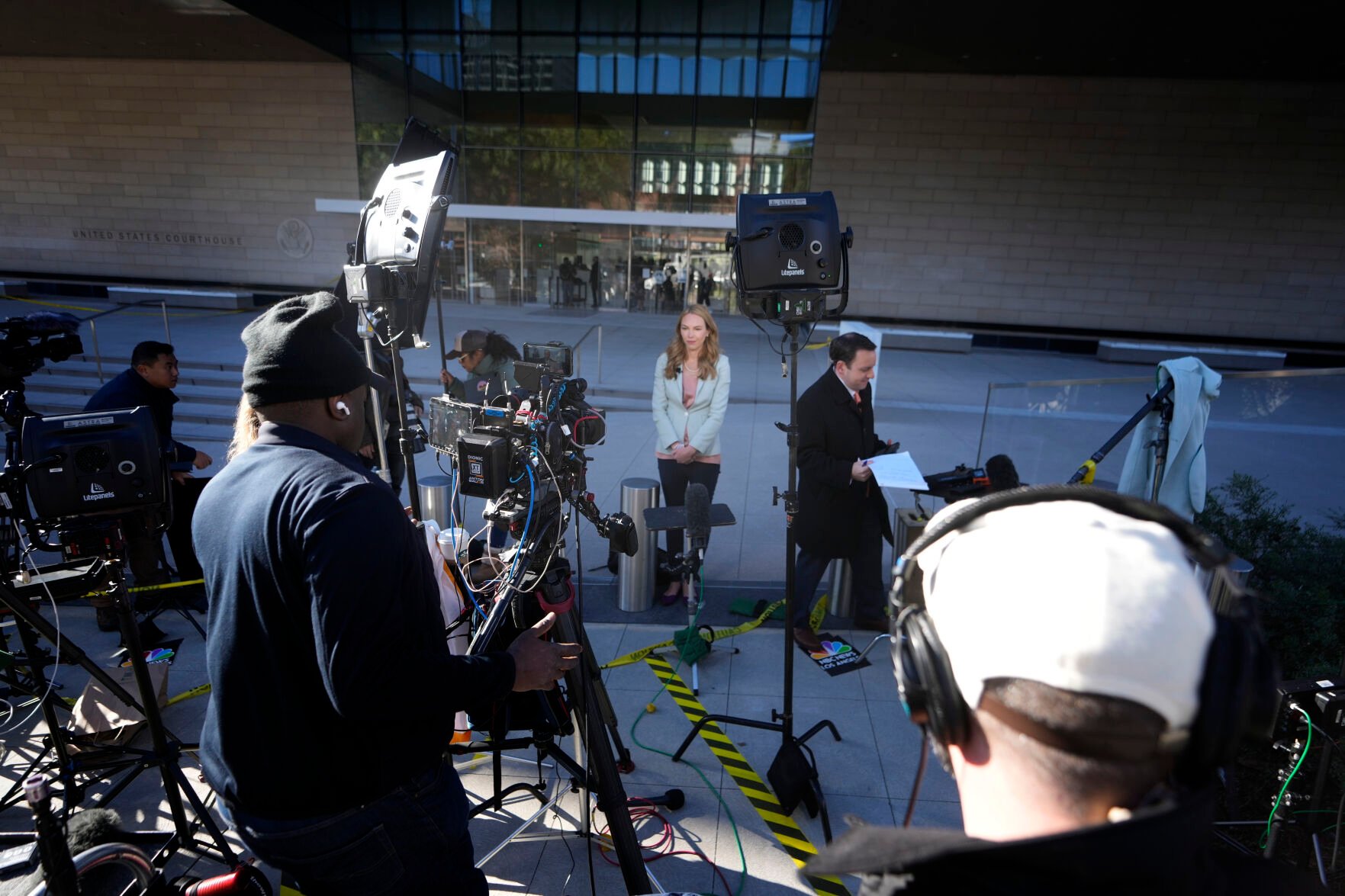 <p>News crews wait in front of a federal courthouse Thursday in Los Angeles. Hunter Biden, President Joe Biden's son, will head back to court on Thursday for arraignment in Los Angeles on federal tax charges filed after the collapse of a plea deal that could have spared him the spectacle of a criminal trial during the 2024 campaign.  </p>