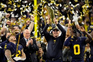 Michigan Completes Undefeated Season With 34 13 College Football Playoff Championship Game Victory Over Washington
