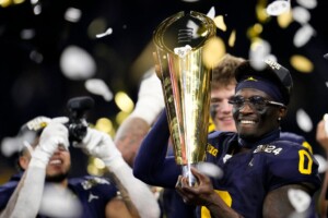 Michigan Completes Undefeated Season With 34 13 College Football Playoff Championship Game Victory Over Washington