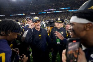 Michigan Completes Undefeated Season With 34 13 College Football Playoff Championship Game Victory Over Washington