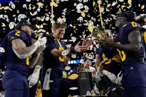 Michigan Completes Undefeated Season With 34 13 College Football Playoff Championship Game Victory Over Washington