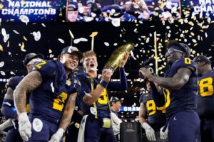 Michigan Completes Undefeated Season With 34 13 College Football Playoff Championship Game Victory Over Washington