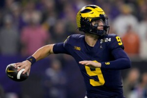 Michigan Completes Undefeated Season With 34 13 College Football Playoff Championship Game Victory Over Washington
