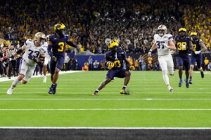 Michigan Completes Undefeated Season With 34 13 College Football Playoff Championship Game Victory Over Washington