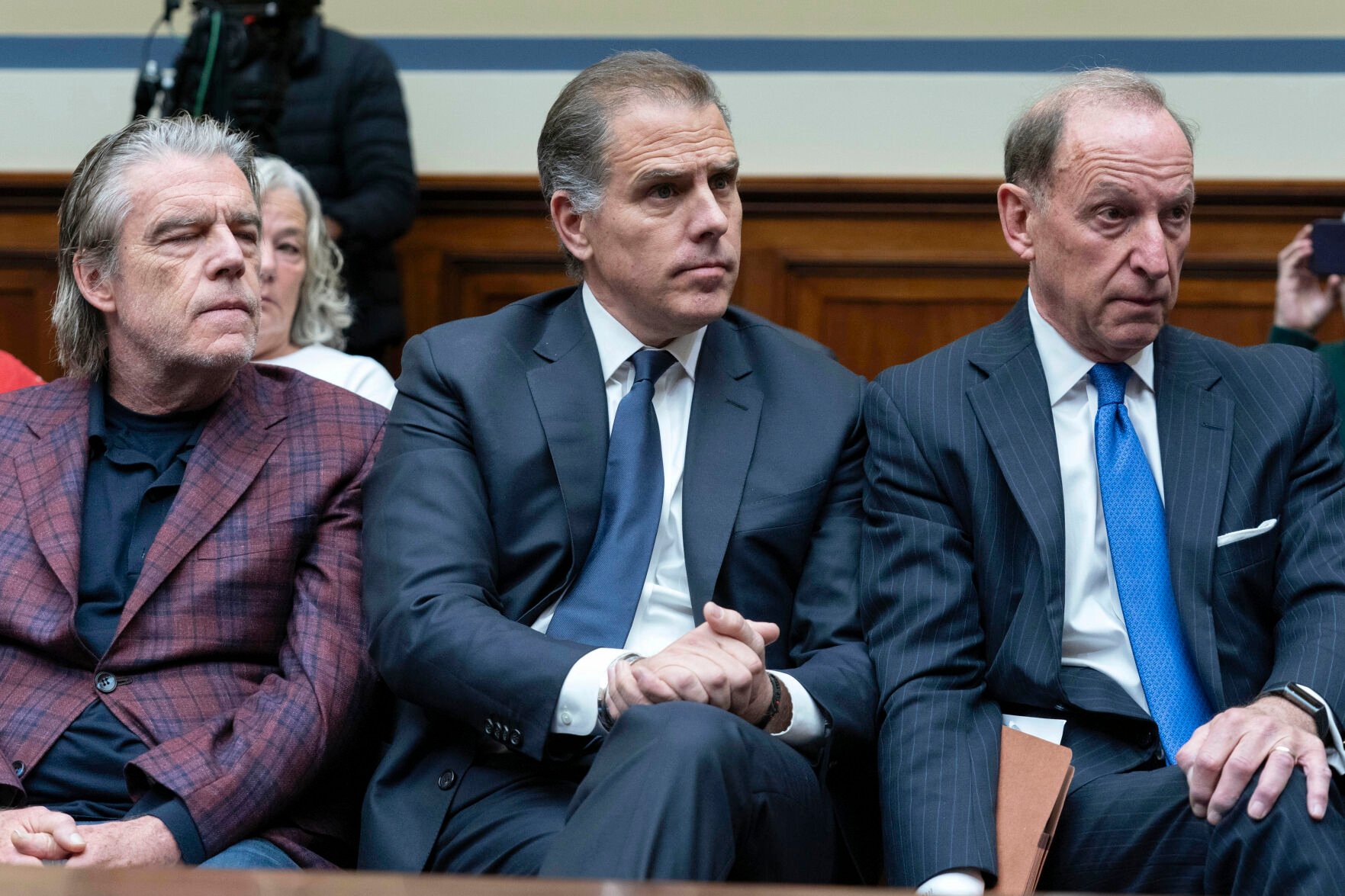 <p>Hunter Biden, President Joe Biden's son, center, accompanied by his attorney Abbe Lowell, right, sit in the front row at a House Oversight Committee hearing as Republicans are taking the first step toward holding him in contempt of Congress on Wednesday on Capitol Hill in Washington.  </p>