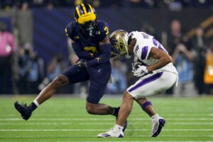 Michigan Completes Undefeated Season With 34 13 College Football Playoff Championship Game Victory Over Washington