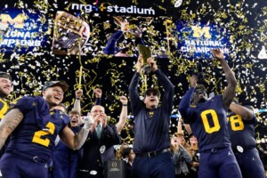 Michigan Completes Undefeated Season With 34 13 College Football Playoff Championship Game Victory Over Washington
