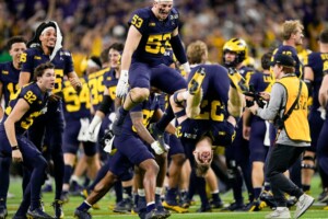 Michigan Completes Undefeated Season With 34 13 College Football Playoff Championship Game Victory Over Washington