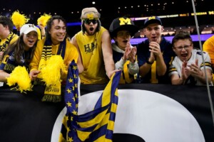 Michigan Completes Undefeated Season With 34 13 College Football Playoff Championship Game Victory Over Washington