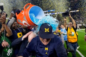 Michigan Completes Undefeated Season With 34 13 College Football Playoff Championship Game Victory Over Washington
