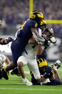 Michigan Completes Undefeated Season With 34 13 College Football Playoff Championship Game Victory Over Washington