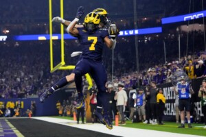 Michigan Completes Undefeated Season With 34 13 College Football Playoff Championship Game Victory Over Washington