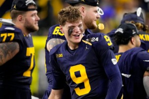 Michigan Completes Undefeated Season With 34 13 College Football Playoff Championship Game Victory Over Washington
