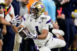 Michigan Completes Undefeated Season With 34 13 College Football Playoff Championship Game Victory Over Washington