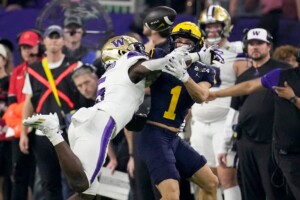 Michigan Completes Undefeated Season With 34 13 College Football Playoff Championship Game Victory Over Washington