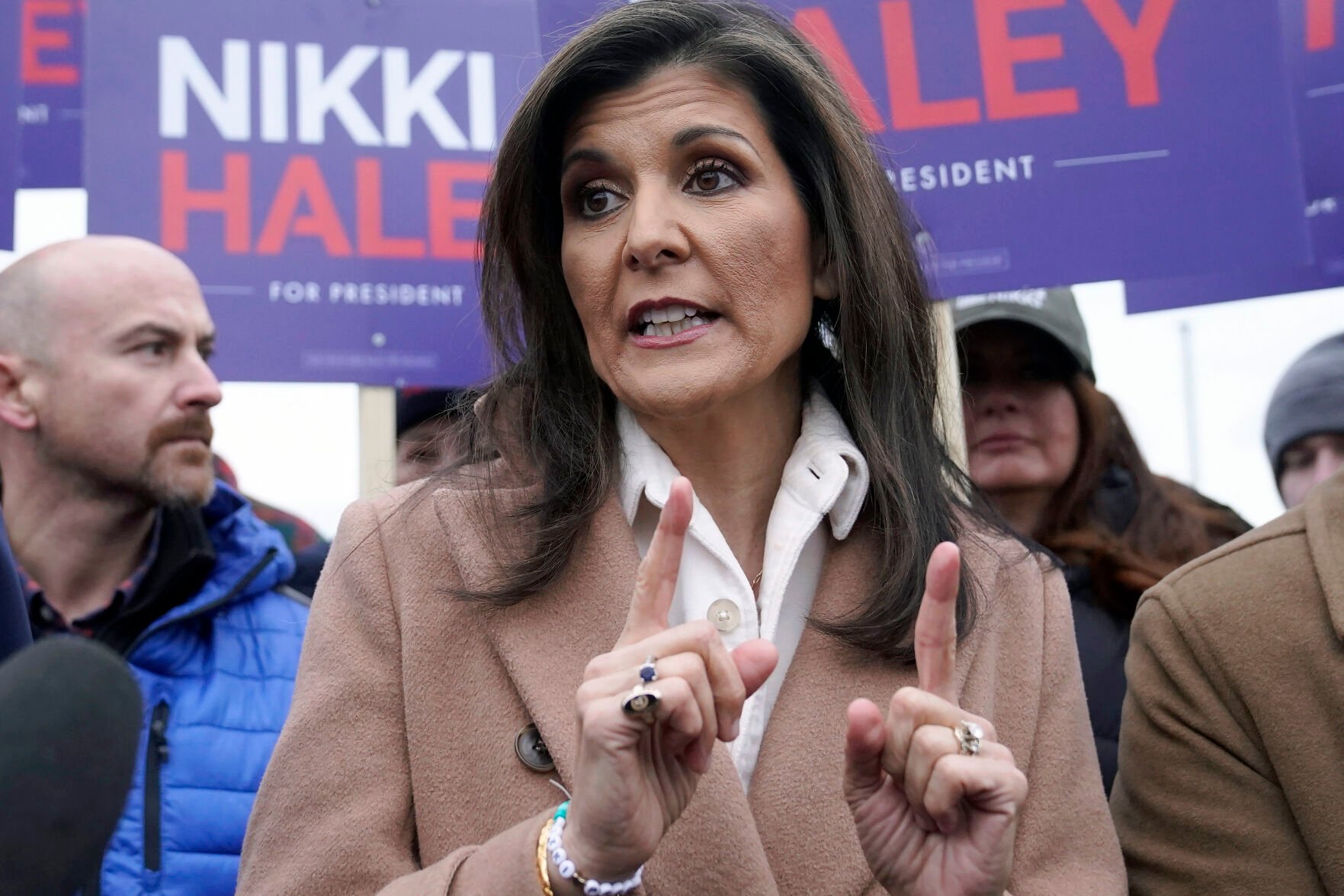 <p>Republican presidential candidate and former U.N. Ambassador Nikki Haley addresses members of the media, Tuesday near a polling site in Hampton, N.H.  </p>