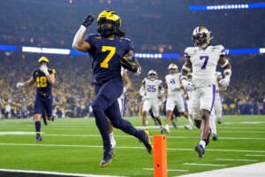 Michigan Completes Undefeated Season With 34 13 College Football Playoff Championship Game Victory Over Washington