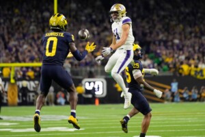 Michigan Completes Undefeated Season With 34 13 College Football Playoff Championship Game Victory Over Washington