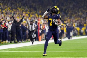 Michigan Completes Undefeated Season With 34 13 College Football Playoff Championship Game Victory Over Washington