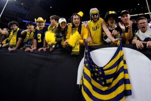 Michigan Completes Undefeated Season With 34 13 College Football Playoff Championship Game Victory Over Washington