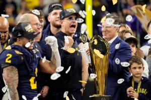 Michigan Completes Undefeated Season With 34 13 College Football Playoff Championship Game Victory Over Washington
