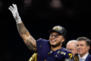 Michigan Completes Undefeated Season With 34 13 College Football Playoff Championship Game Victory Over Washington