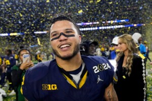 Michigan Completes Undefeated Season With 34 13 College Football Playoff Championship Game Victory Over Washington