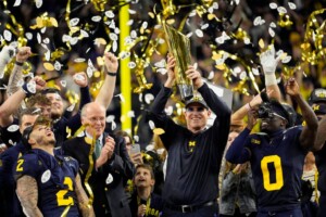 Michigan Completes Undefeated Season With 34 13 College Football Playoff Championship Game Victory Over Washington