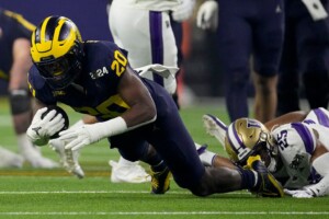 Michigan Completes Undefeated Season With 34 13 College Football Playoff Championship Game Victory Over Washington