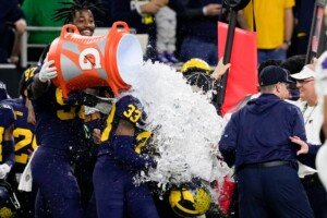 Michigan Completes Undefeated Season With 34 13 College Football Playoff Championship Game Victory Over Washington